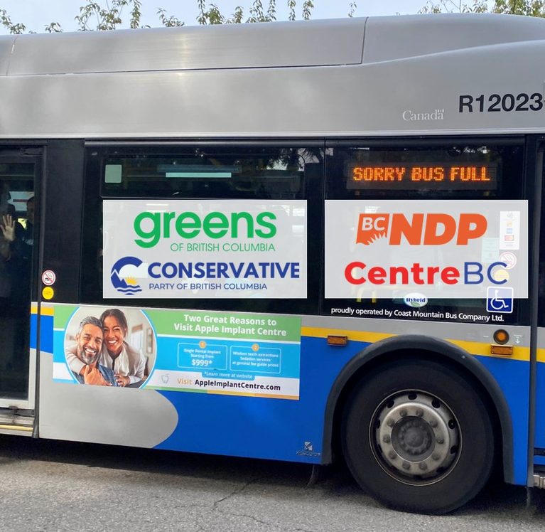 A bus saying "sorry bus full" with the logos of the four major provincial parties in the windows: Greens, Conservatives, NDP, and CentreBC